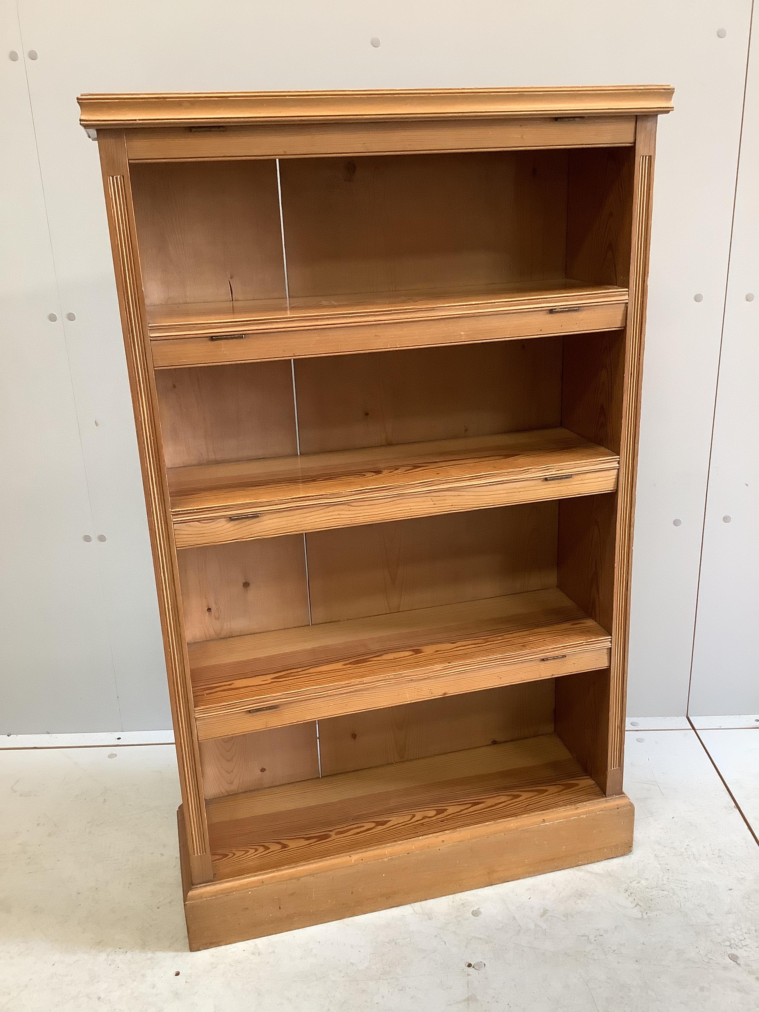 An early 20th century pitch pine open bookcase, width 75cm, depth 25cm, height 122cm